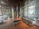 Modern fitness center with various exercise equipment