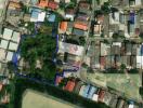 Aerial view of property and surrounding buildings