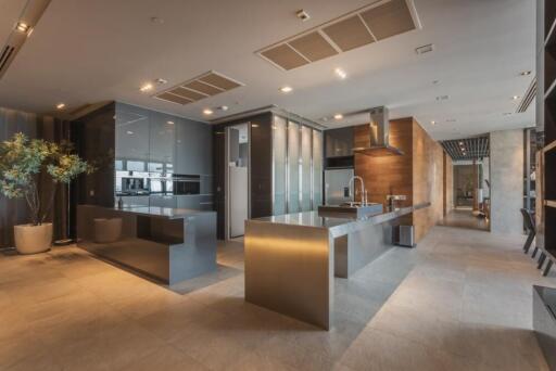 Modern kitchen with stainless steel island and appliances