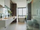 Modern bathroom with glass enclosures and a large window