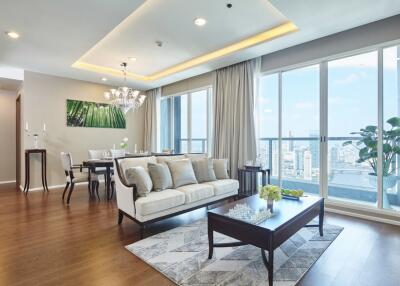 Spacious living room with modern decor and city view