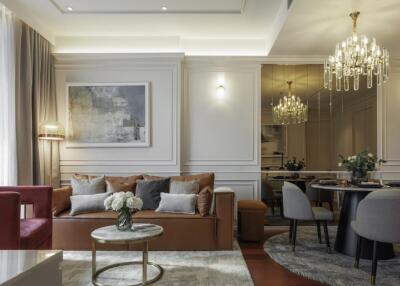 Modern living room with elegant decor and adjoining dining area