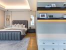 Modern bedroom with a luxurious bed, stylish lighting, and shelves with decor items