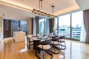 Modern dining room with a large window view