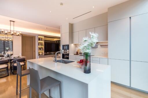 Modern kitchen with island and dining area