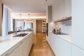 Modern kitchen with white cabinets and island