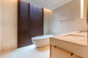 Luxury bathroom with freestanding bathtub and modern fixtures