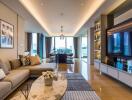 Modern living room with a sectional sofa, coffee table, television, and dining area in the background