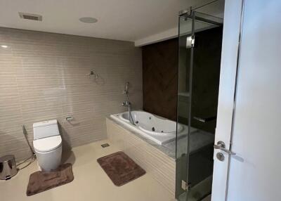 Modern bathroom with bathtub and shower