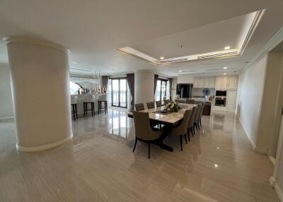 Modern kitchen and dining area with natural light