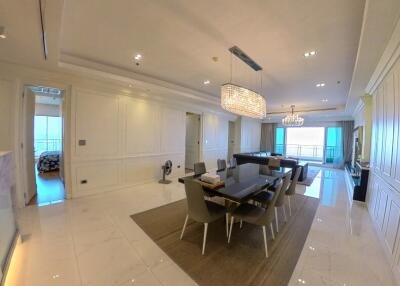 Spacious dining room with elegant decor and modern furnishings