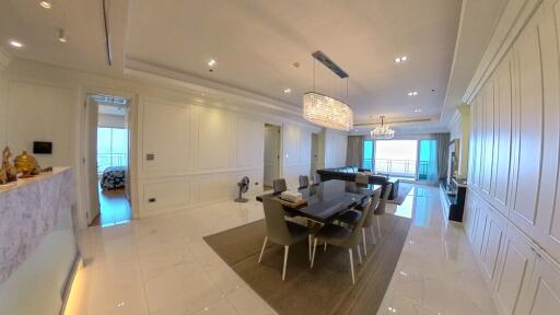 Spacious dining room with elegant decor and modern furnishings