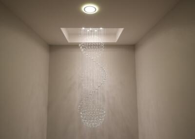 modern chandelier in a hallway