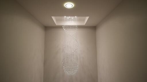 modern chandelier in a hallway