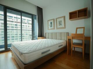 Spacious bedroom with large window