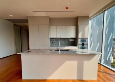 Modern kitchen with island and large windows