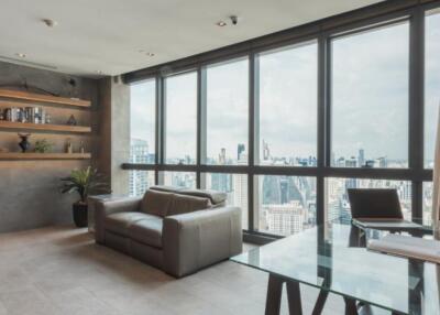 Modern living room with city view and large windows