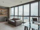 Modern living room with city view and large windows