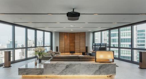 Modern high-rise living room with panoramic city views