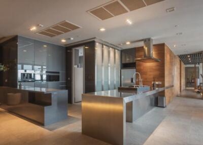 Modern kitchen with stainless steel appliances and sleek design