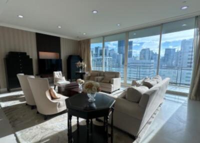 Living room with large windows and city view