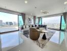 Modern living room with large windows and city view