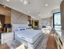 Spacious bedroom with modern decor and ample natural light