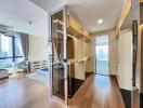 Modern bedroom with ample natural light and a walk-in closet