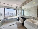 Modern bathroom with large window and city view