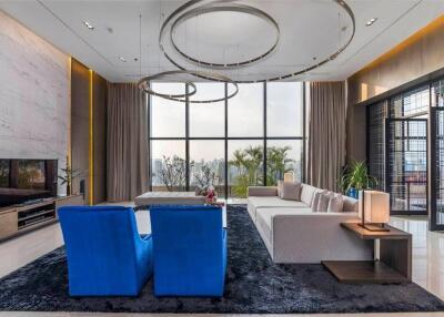 Modern living room with large windows and city view