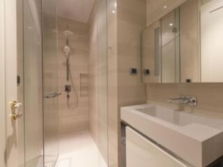 Modern bathroom with glass shower and vanity