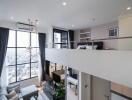 Modern duplex living room with large windows and high ceilings