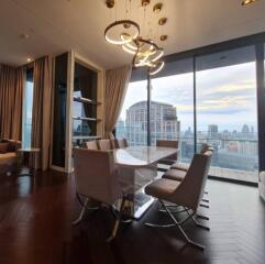 Dining area with large windows and city view