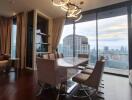 Dining area with large windows and city view