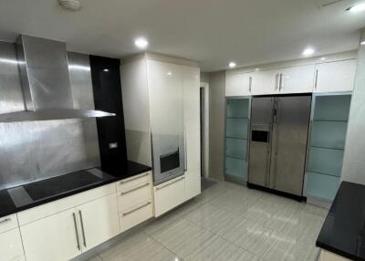 Modern kitchen with stainless steel appliances