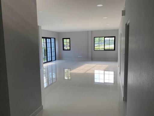 Spacious modern living room with large windows