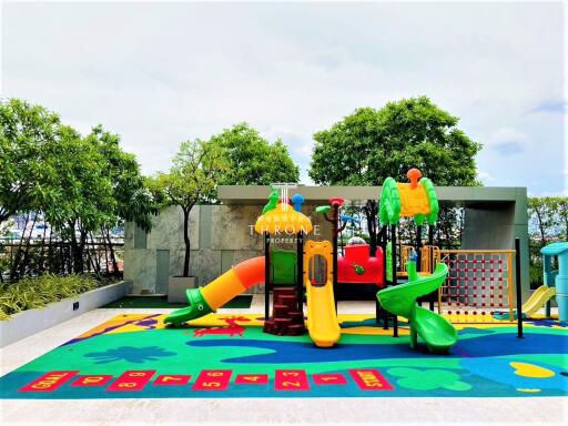 Colorful playground area with various play structures