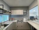 Modern kitchen with appliances and minimalist design