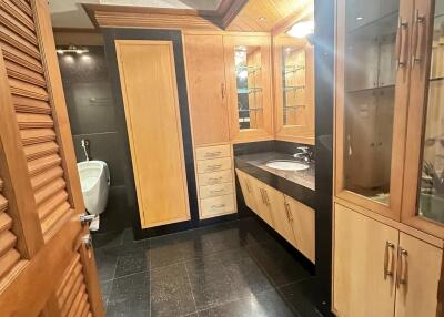 Spacious bathroom with modern fixtures and ample storage