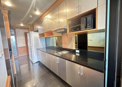 Modern kitchen with ample storage and appliances