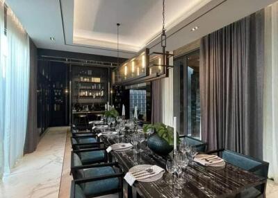 Elegant dining room with a large table and modern decor