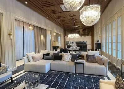 luxurious living room with elegant chandeliers