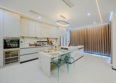 Modern kitchen with island and dining area