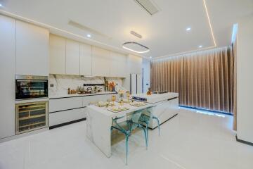 Modern kitchen with island and dining area