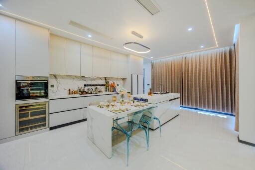 Modern kitchen with island and dining area