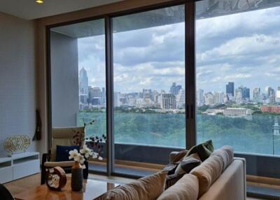 Living room with large windows and city view