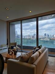 Living room with large windows and city view