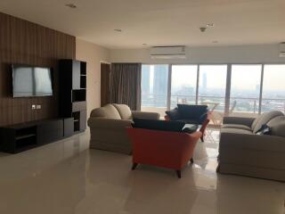 Spacious living room with city view