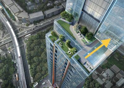 High-rise apartment building with rooftop garden and pool