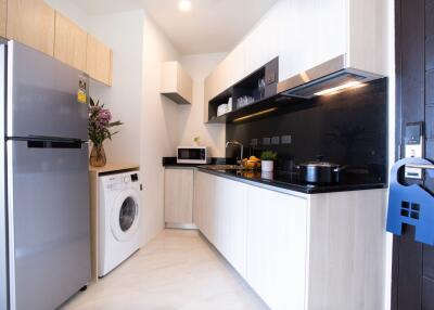 Modern kitchen with appliances and cabinetry